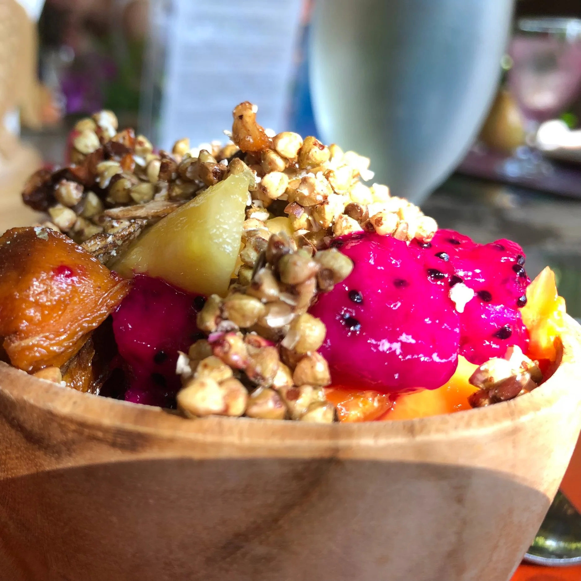 A tropical fruit bowl with dragon fruit and granola at the retreat
